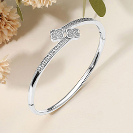 SECRET BOX_Stainless Steel Rhinestone Pave Quatrefoil Tip End Wrapped Hinged Bangle Bracelet