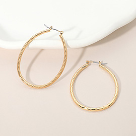 Gold Dipped Twisted Oval Pin Catch Hoop Earrings